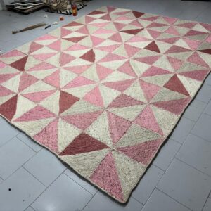 Pink and ivory geometric flatweave rug